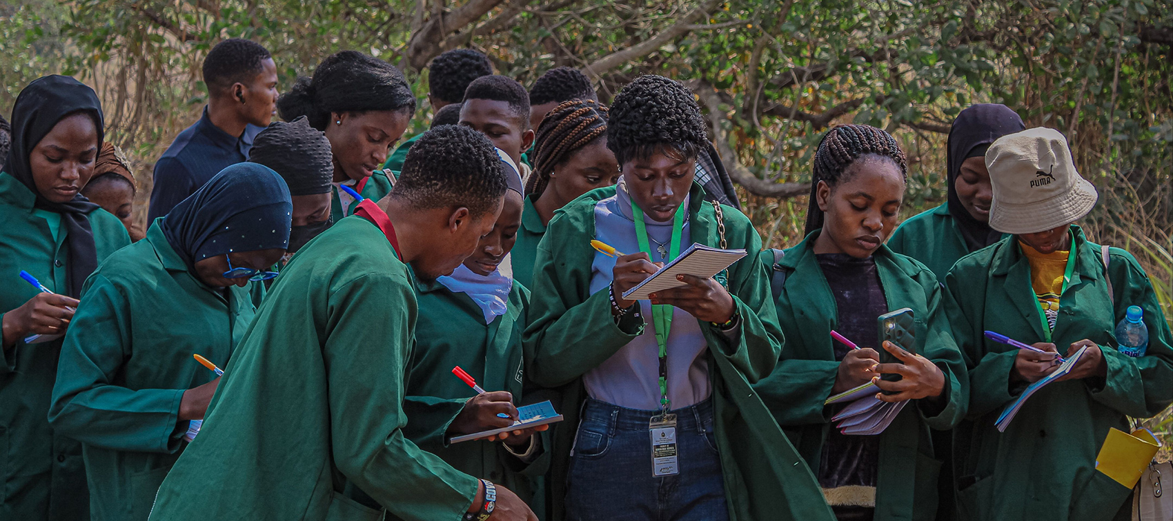 Students wearing green uniform